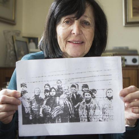 Marta Wise holds a famous photo that has become one of the most iconic images of the Holocaust (Photo: AP) (Photo: AP)