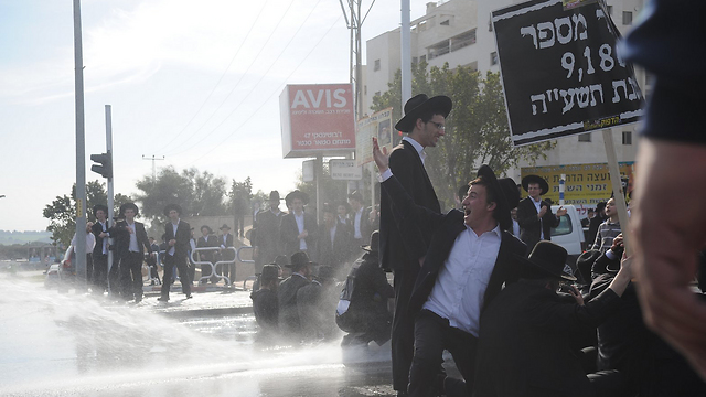 Haredi men protesting the draft in February (Photo: Avi Roccah)