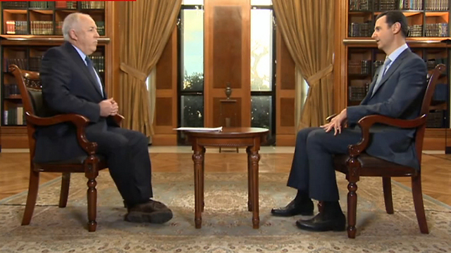 אסד בראיון לכתב BBC ג'רמי בואן בדמשק ()
