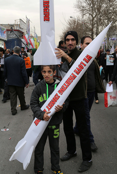 'We love fighting Zionist Regime' (Photo: AFP)