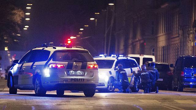 Police at the scene of the shooting (Photo: Reuters)