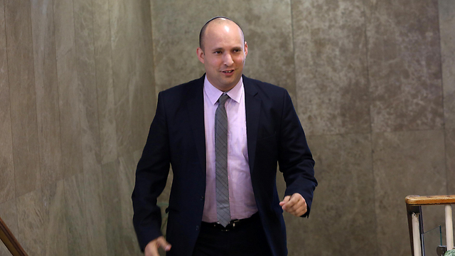 Bennett on his way to weekly Cabinet meeting (Photo: Amit Sha'abi)