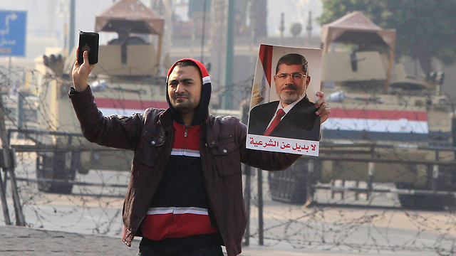 Morsi's supporters protest against his imprisonment (Photo: Reuters)