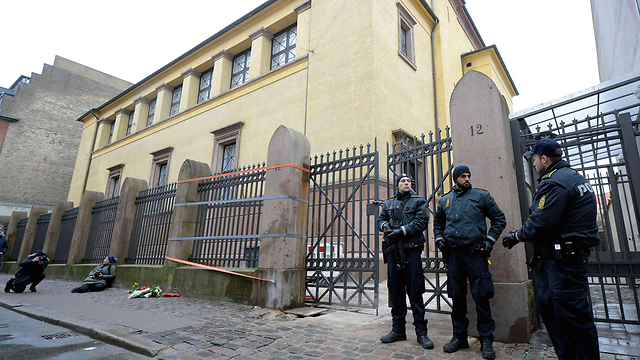 Police officers guard Copenhagen synagogue that was attacked. (Photo: Reuters)