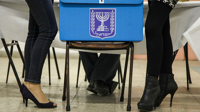 Women at the voting booth (Photo: Avishag Shaar-Yashuv)