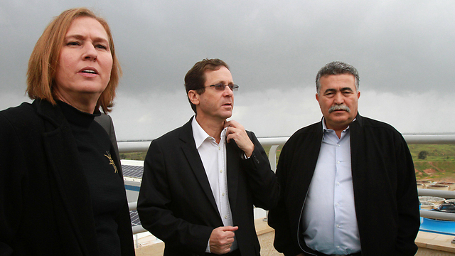 LIvni and Herzog with leftwing stalwart Amir Peretz. The elections look set to be a tight race. (Photo: AFP) (Photo: AFP)