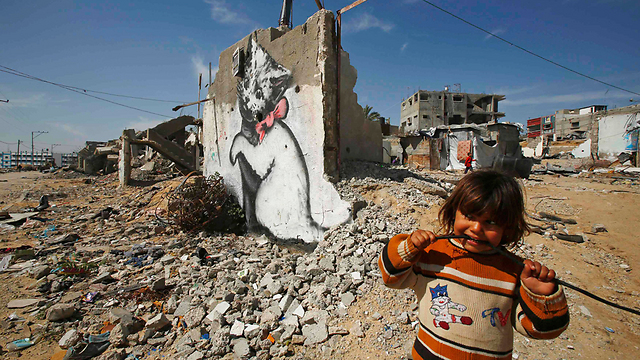 Graffiti on destroyed Gaza building. (Photo: Reuters)