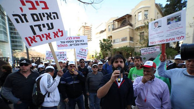 Protesting in Tel Aviv against the layoffs (Photo: Motti Kimchi)