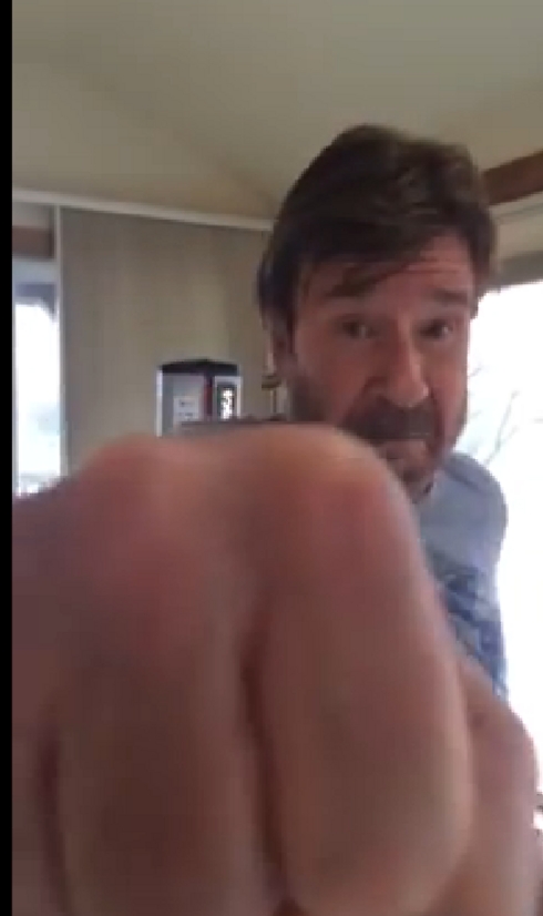 Chuck Norris. Shaking his fist at Obama? 