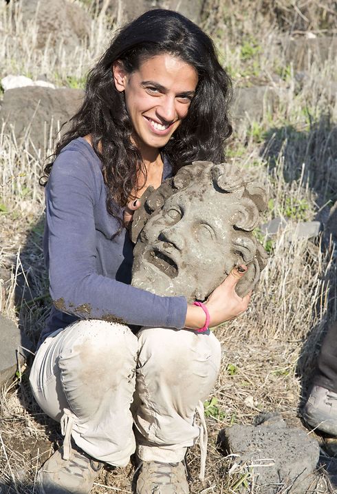 One of the researchers poses with the mask of Pan (Photo: Dr. Michael Eisenberg)