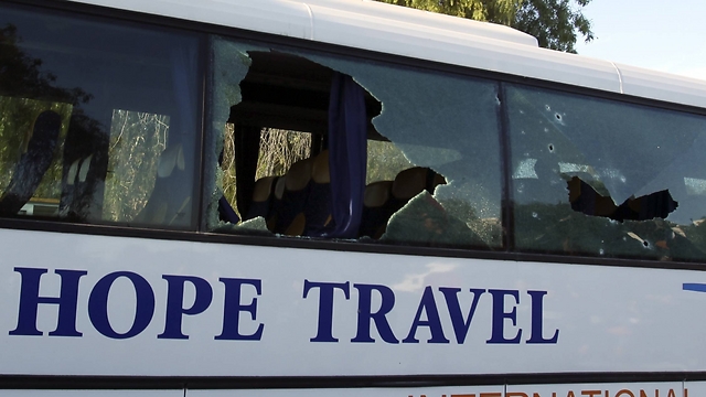 Tourist bus damaged during attack. (Photo: Reuters)