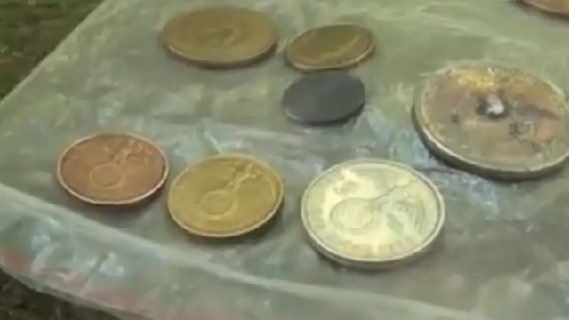 German coins found in structure.