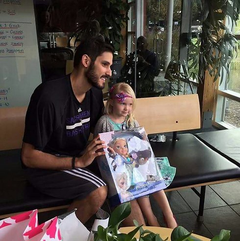 Casspi, the girl and the doll (photo from Instagram)