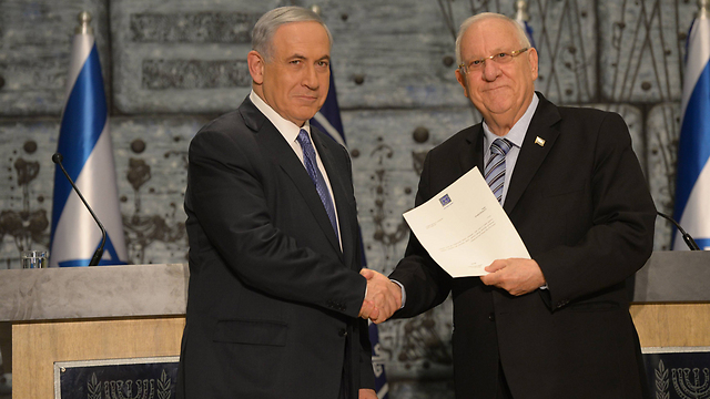 Netanyahu and Rivlin. Renewed trust Netanyahu received from Israeli public doesn't guarantee that a national policy will be implemented (Photo: Amos Ben Gershom, GPO)   