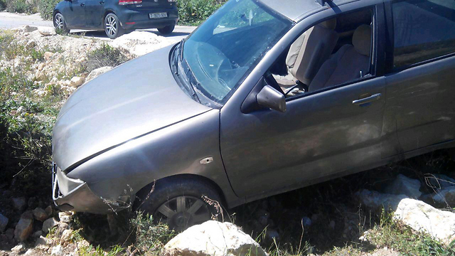 The Palestinian's car after he drove it into a ditch.