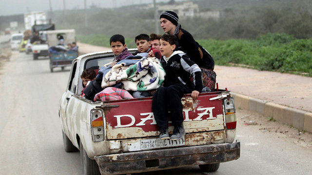 Civilians returning to Idlib (Photo: Reuters)