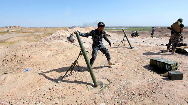 Iraqi security forces in Tikrit (Photo: Reuters) (Photo: Reuters)