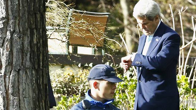 US Secretary of State John Kerry looks at his watch during a break in Iran nuclear talks (Photo: Reuters) (Photo: Reuters)