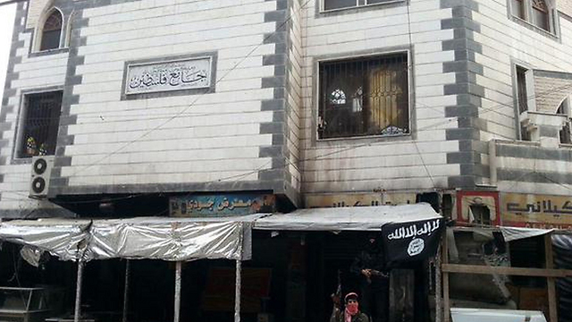 Photo released by ISIS fighters from inside the Yarmouk refugee camp.