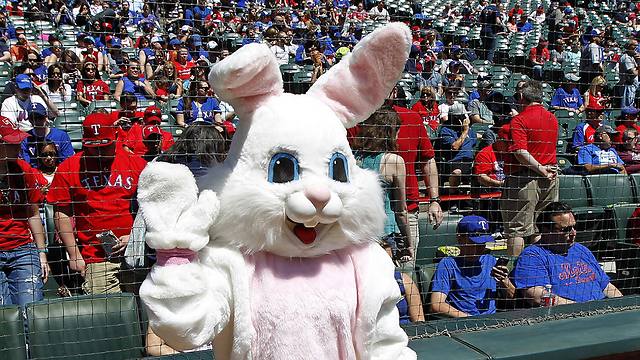 The Easter Bunny makes an appearance behind home plate (Photo: Ron Jenkins/Fort Worth Star-Telegram/TNS)