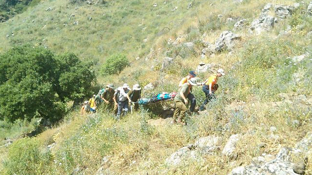 Rescue units save woman at Zavitan Stream. (Photo: Golan Rescue Unit Spokeswoman)