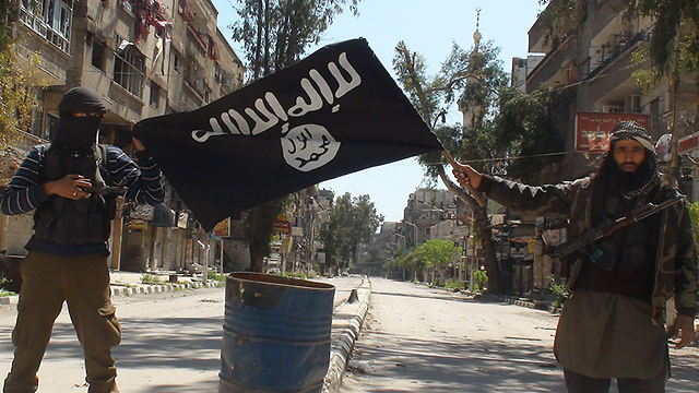 Islamic State fighters in the Yarmouk refugee camp on the outskirts of Damascus