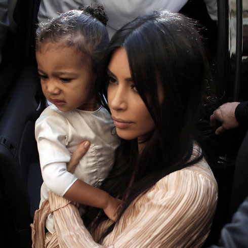 Kim with North West in Jerusalem (Photo: AFP)