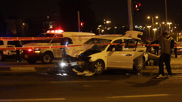 Kutina's vehicle at the scene of the attack (Photo: Gil Yohanan)