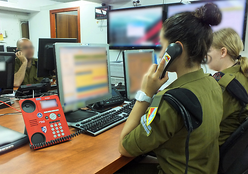 Troops at one of the IDF's situation rooms.