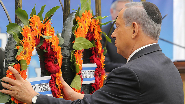 Netanyahu at Memorial Day ceremony. 'Leaders of democracies can become prisoners of their own rhetoric' (Photo: Gil Yohanan)