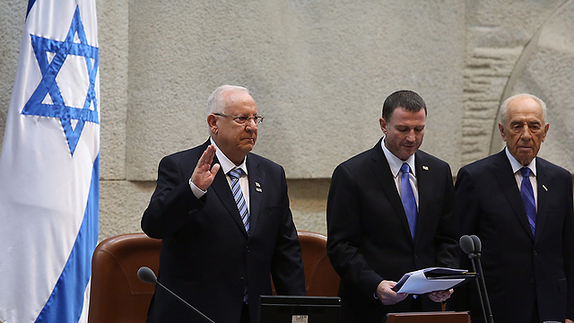 Rivlin being sworn in. 'As president you are facing everything that the people are facing.' (Photo: Gil Yohanan) 