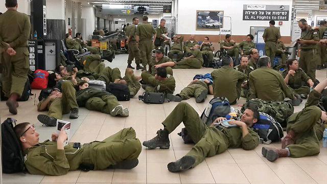 Members of the IDF rescue mission wait in Ben Gurion International Airport (Photo: Yoav Zitun)