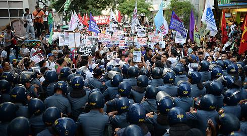 הפגנות באינדונזיה לקראת ההוצאה להורג, אתמול (צילום: AFP) (צילום: AFP)
