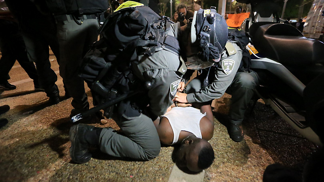 Ethiopian being arrested during the protest (Photo: Yaron Brener)