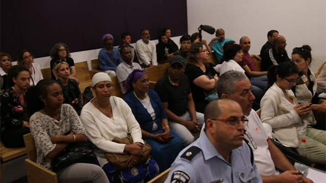 Families of those arrested during protest wait during hearing at Tel Aviv Magistrate court. (Photo: Motti Kimchi)