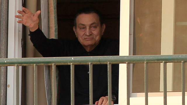 Mubarak waves to his supporters from the hospital earlier this week (Photo: Reuters) (Photo: Reuters)
