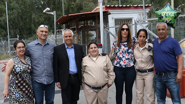 Mor and Tsofit with their families (Photo: Shaul Golan)