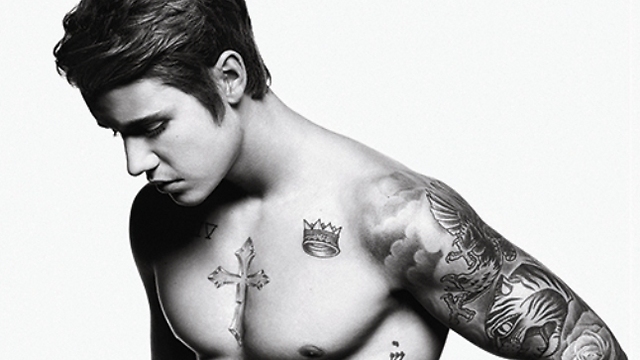 Bieber's 'offensive' abs on the cover of Men's Health 