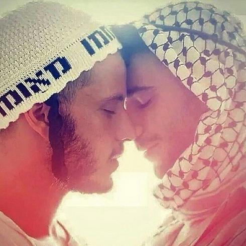 The photo of a Jewish and Arab man nearly kissing.