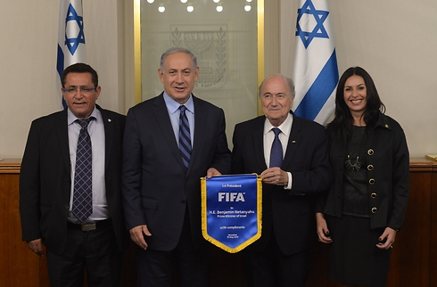 From left: Israel soccer federation chair Ofer Eini, Benjamin Netanyahu, Sepp Blatter and Culture and Sports Minister Miri Regev (Photo: GPO)