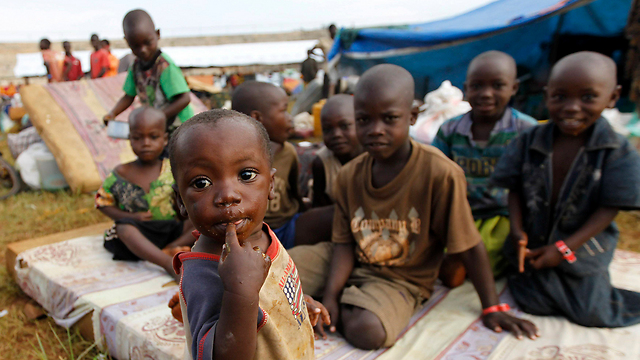 ילדים מבורונדי במחנה פליטים בטנזניה                   (צילום: רויטרס) (צילום: רויטרס)