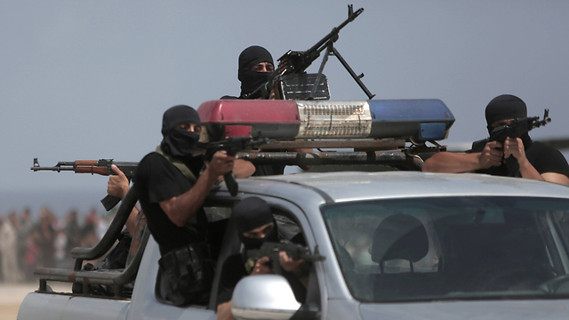"השתמשו במעצרים שרירותיים ובעינויים להשתקת מתנגדים". כוחות הביטחון של חמאס (צילום: AP) (צילום: AP)