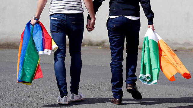 Two men holding hands in Ireland. (Photo: Reuters) (Photo: Reuters)