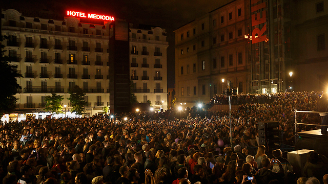 תומכי "פודמוס" מתאספים במדריד, אמש (צילם: AP) (צילם: AP)