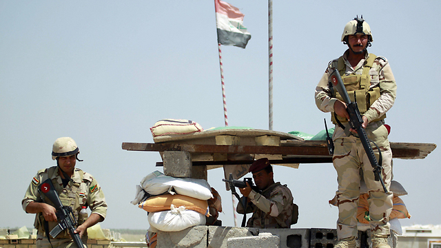 Iraqi troops south of Baghdad (Photo: AFP)