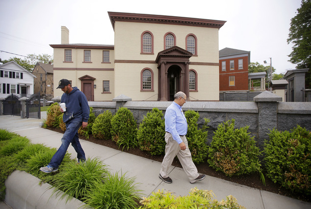 Employees walk through Patriots Park at the Touro Synagogue, the United States' oldest, in Newport, RI (Photo: AP)