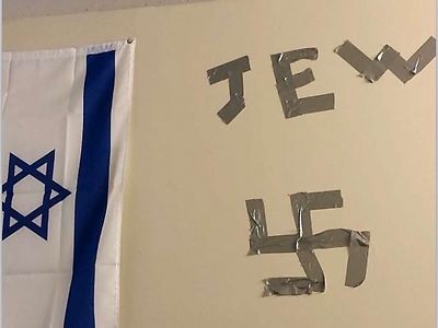 Swastika and the word 'Jew' taped next to student's Israeli flag in a dorm room at Dexel (Photo: Courtesy of ADL) (Photo: Courtesy of ADL)