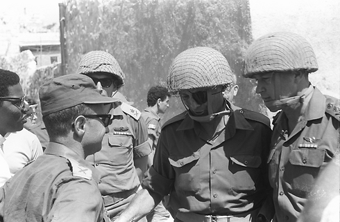 Then-IDF chief Rabin (right) with then-defense minister Dayan (second to the right), then-GOC Central Command Uzi Narkiss and then-chief of the Operations Directorate Rehavam Ze'evi in Jerusalem (Photo: IDF Archive)
