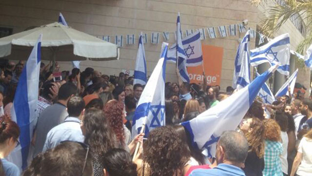 Partner employees protest the BDS movement.