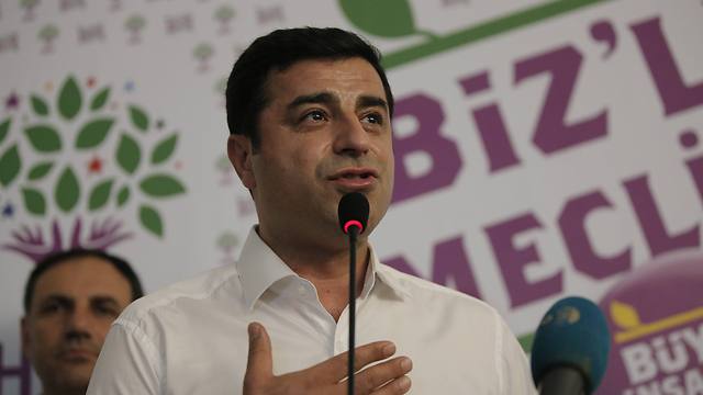 Selahattin Demirtas, joint leader of the Peoples' Democratic Party, speaks to supporters after his party's breakthrough in the elections. (Photo: AP)